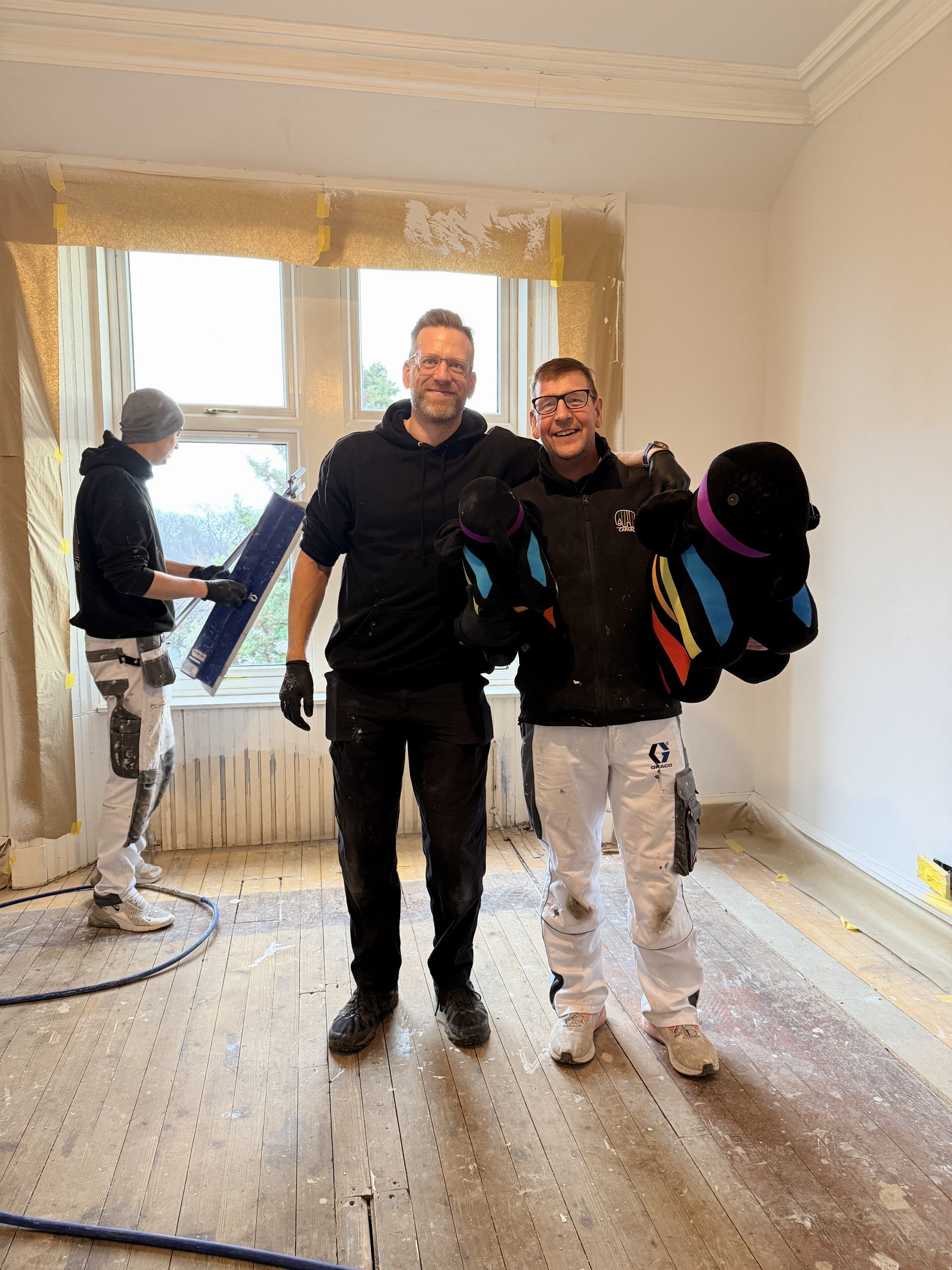 Decorators with Caparol elephant mascots on a job