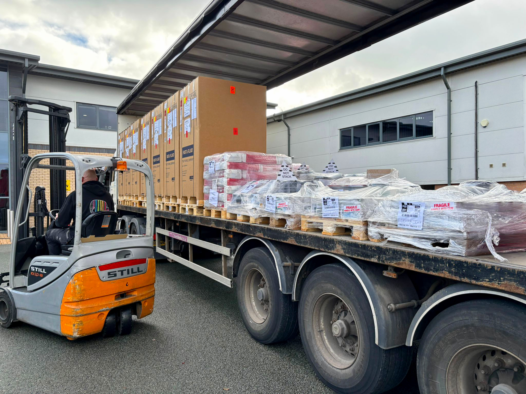 Forklift unloading Caparol deliveries at the UK warehouse